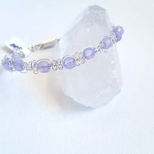 Macrame wire bracelet with purple glass bead